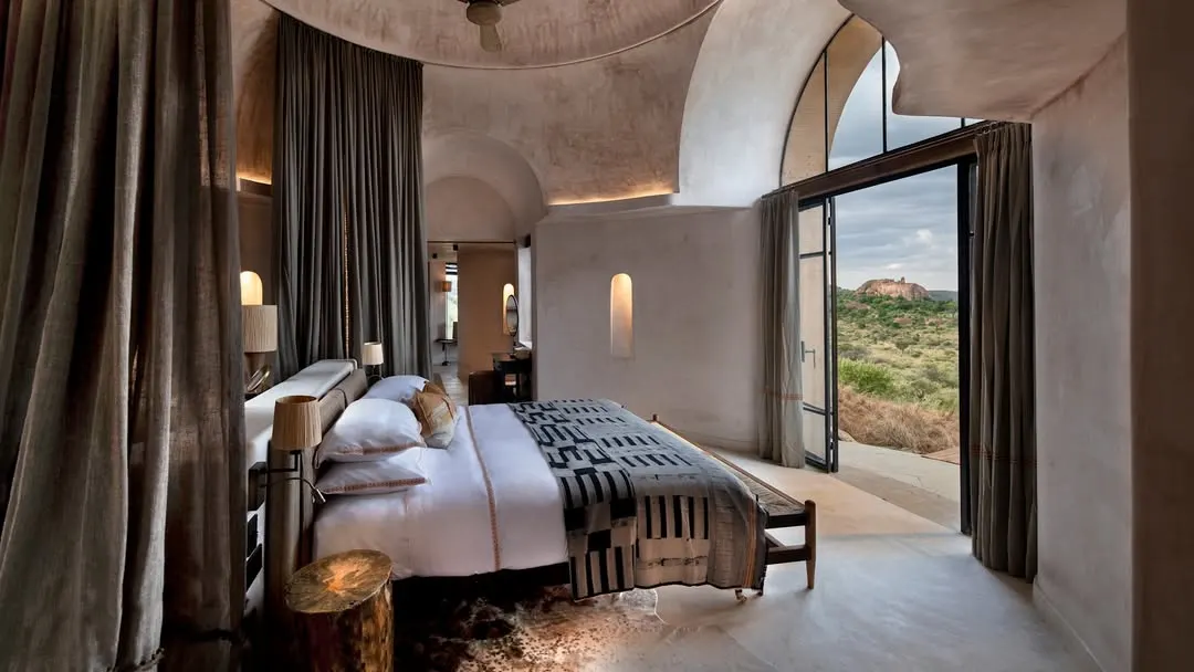 photo of bed in suyian lodge suite