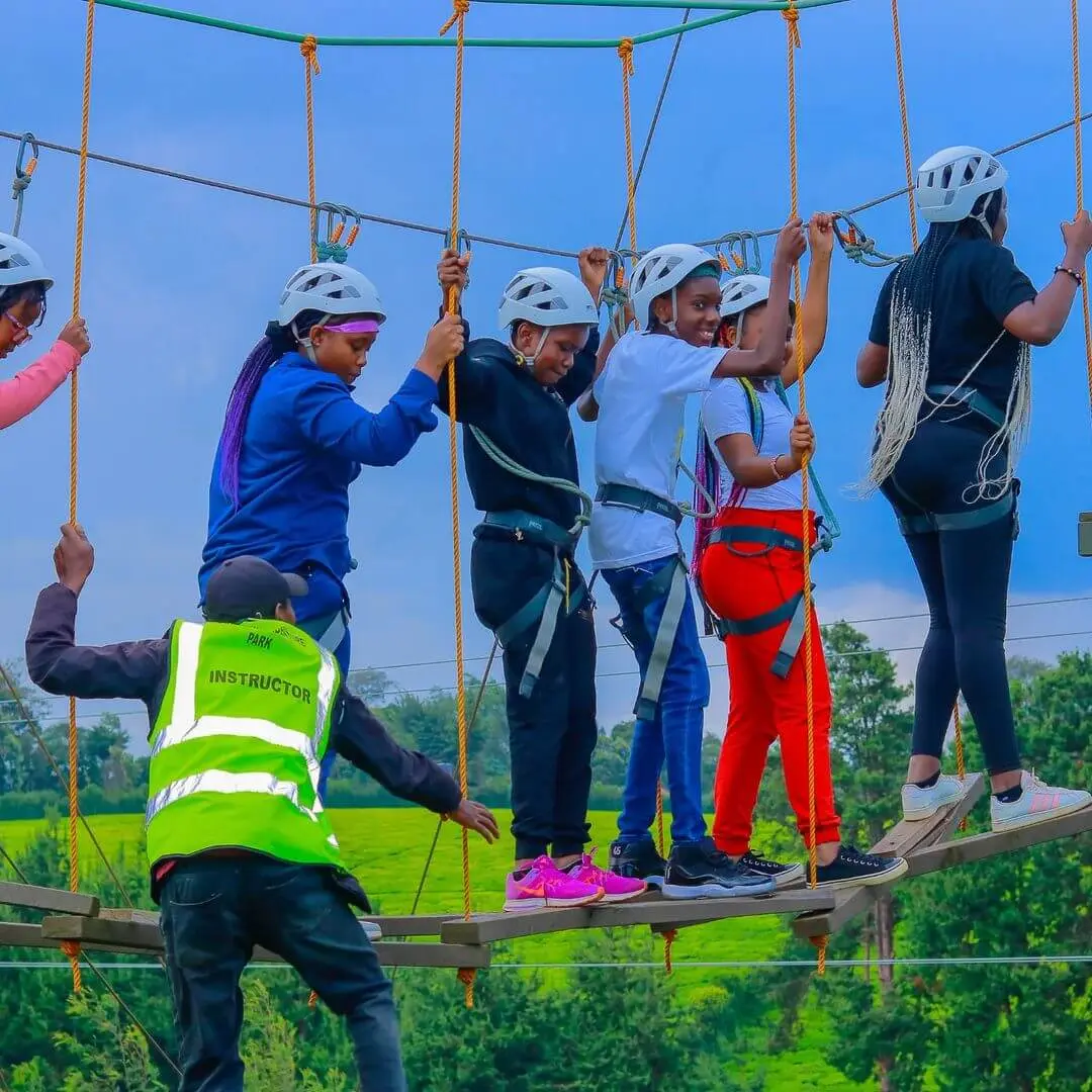 Children doing a high rope course level 1 at Burudani Adventure Park. Photography: Instagram @burudaniadventurepark