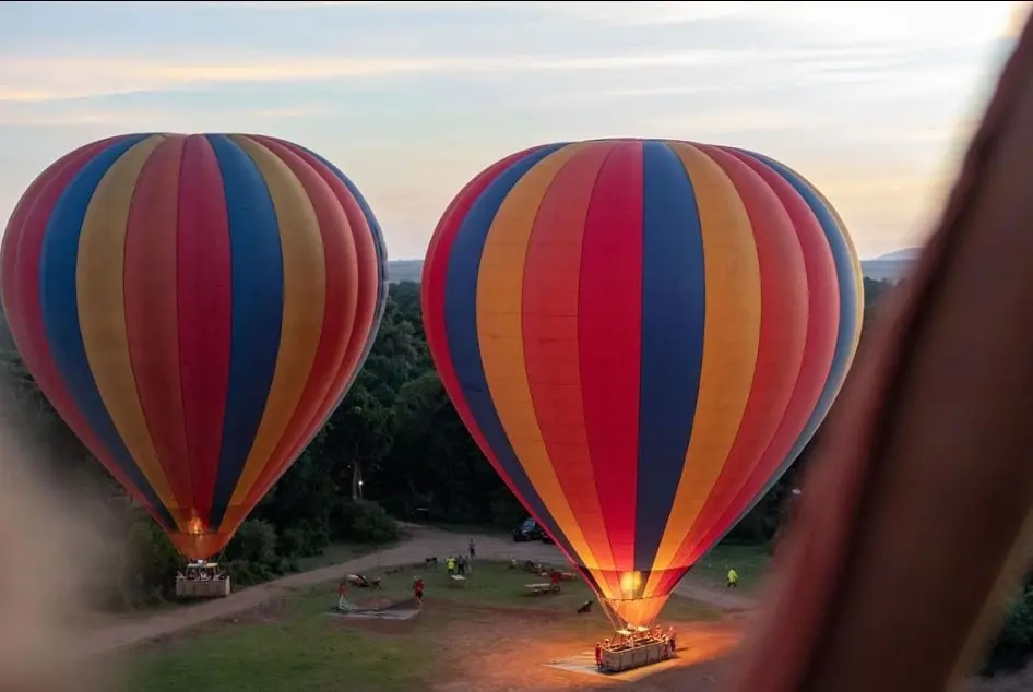 Hot air balloons being filled up at Masai Mara National Reserve - credit-instagram - governorsballoonsafaris