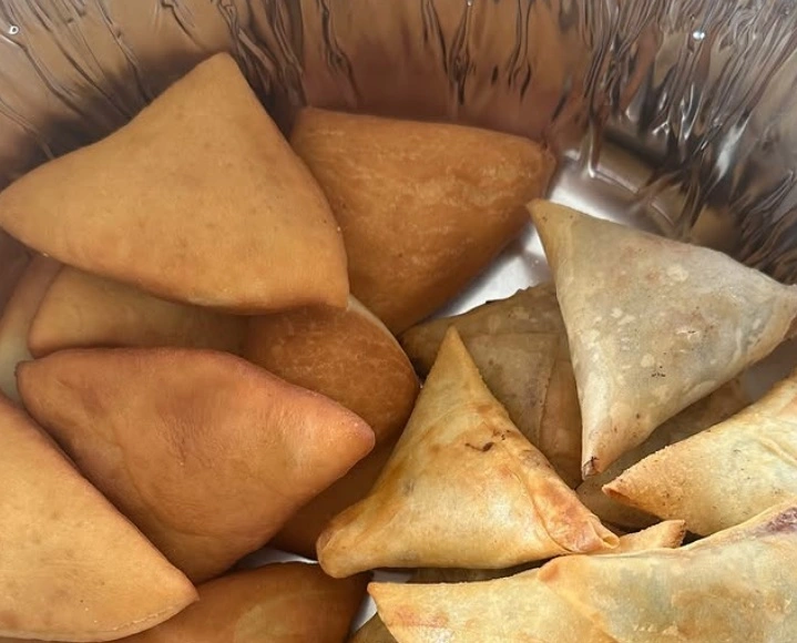 picture of mandazi and samosa in kenya food tours