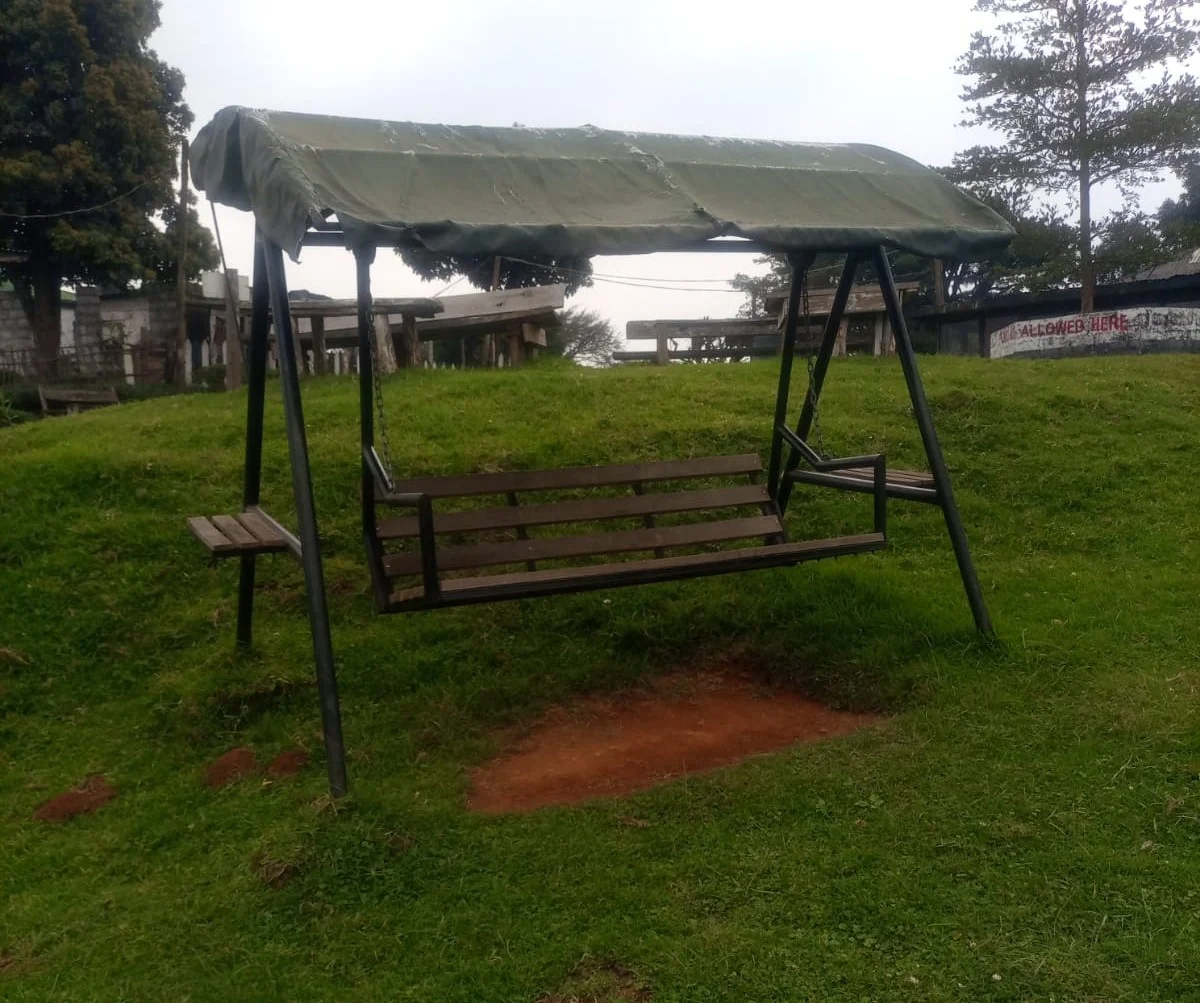 the swinging bench at picnic area of waterfalls inn tigoni