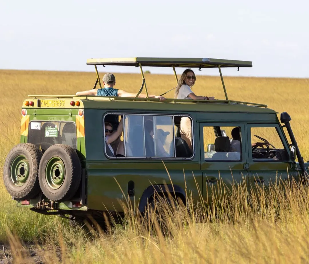 Tourists in a van at Masai Mara National Reserve