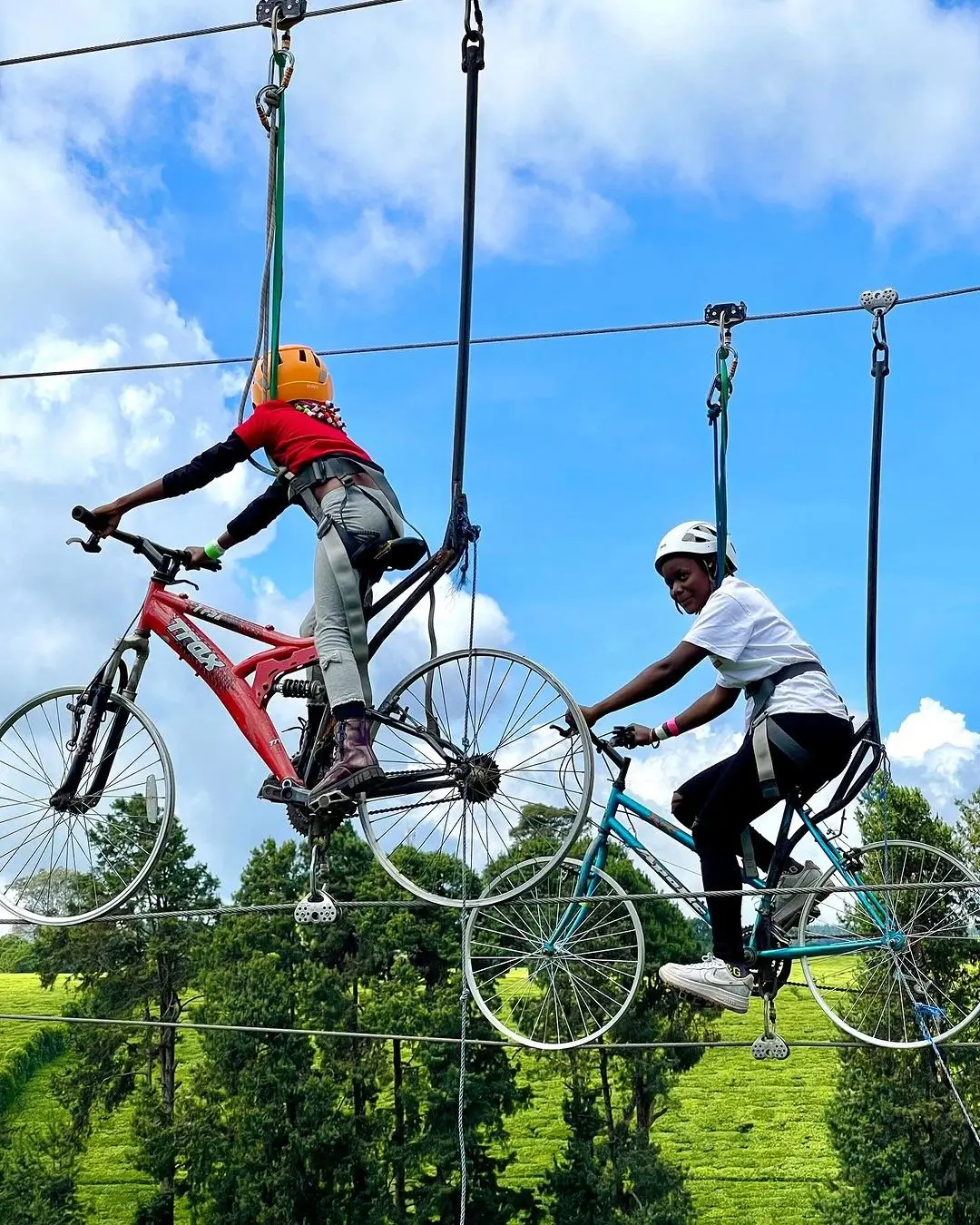 Two riders in tandem at sky cycling in Limuru at Burudani Adventure Park. Photography: Instagram @sapphireadventures_