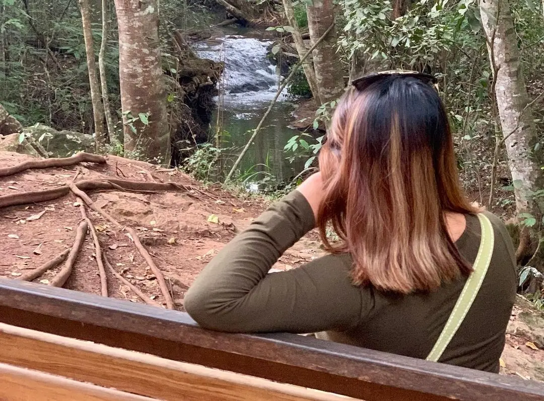 A visitor doing meditation and Yoga at Karura Forest in Nairobi